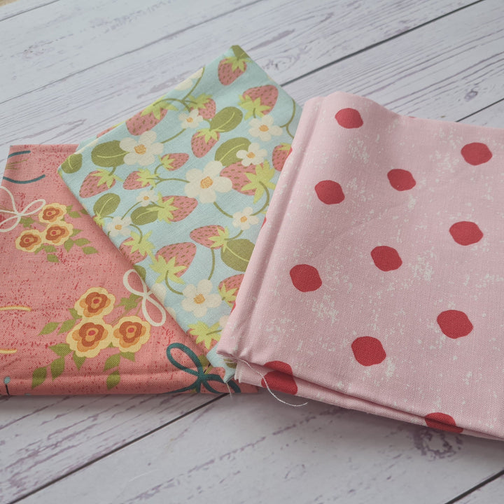 Strawberry Jam cotton fabric by Riley Blake. Pink, green daisy floral. Per 1/2M
