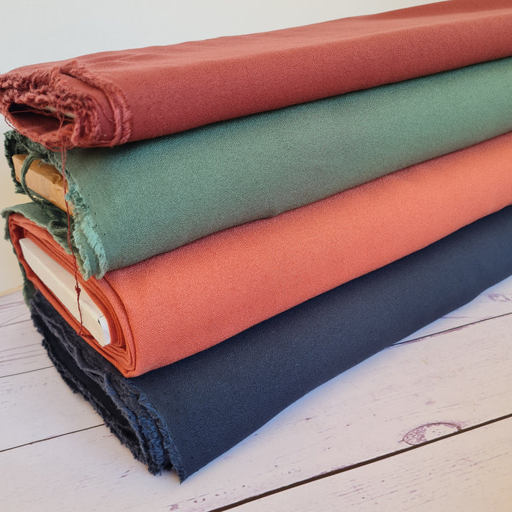 100% viscose crêpe fabric, Cousette (France). Coral, cream, anthracite, brick. Per 1/2m