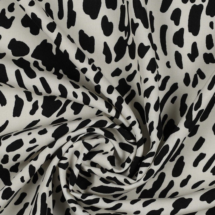 Off white & black Animal Print 100% Viscose Challis dress fabric - per half metre.