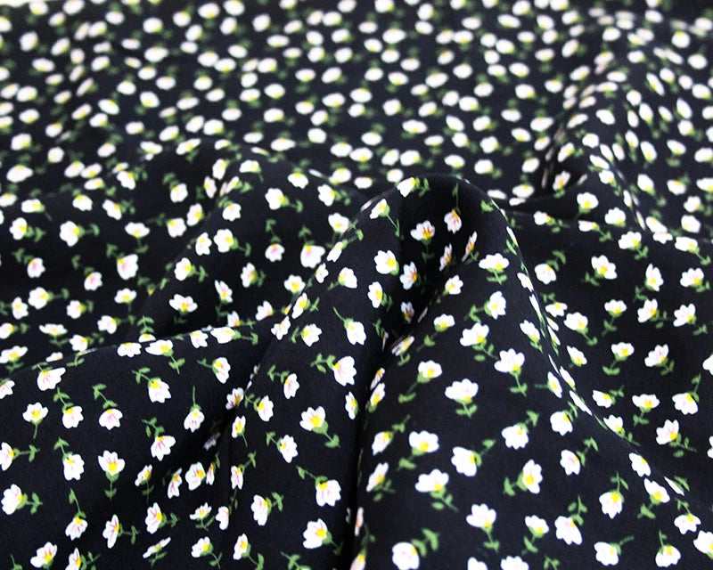Navy blue ditsy floral Viscose Challis dressmaking fabric. Per 1/2m