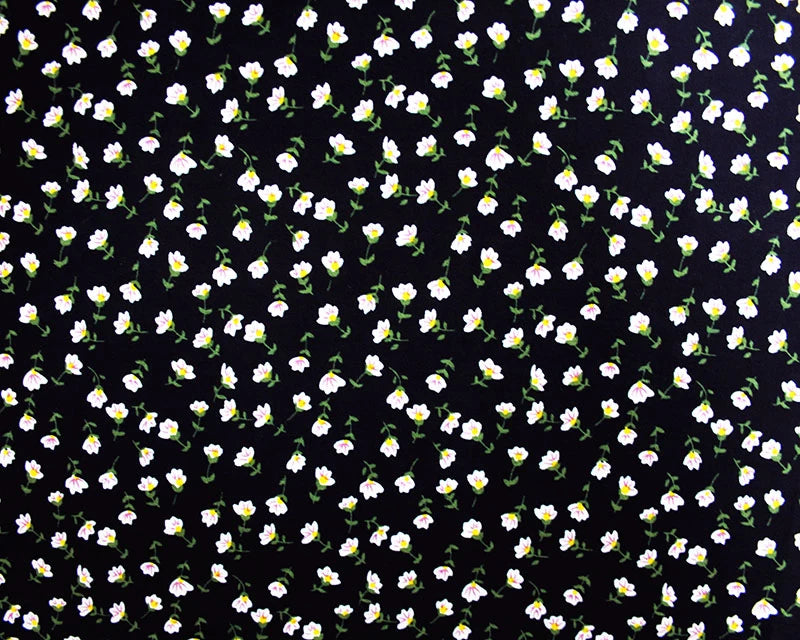 Navy blue ditsy floral Viscose Challis dressmaking fabric. Per 1/2m