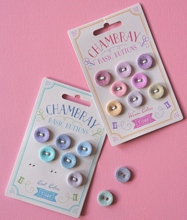 Tilda chambray pastel buttons on a pink background