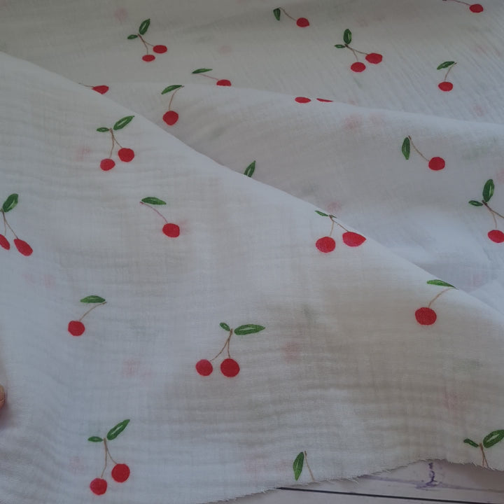Cherry on white double gauze 100% cotton muslin fabric 85cm roll end