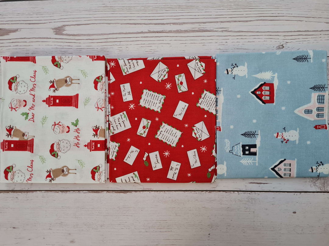 Christmas Post - Christmas fat quarters bundle of 5 quilting cotton Fabrics.