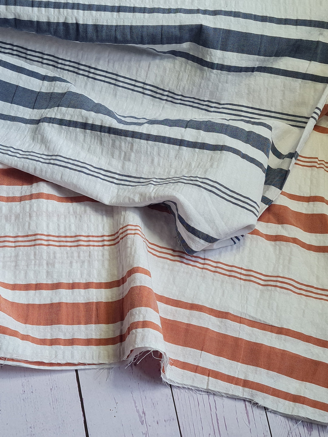 Lightweight yarn-dyed horizontal stripe cotton stretch woven fabric by the half metre.