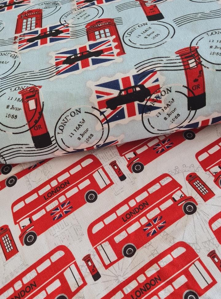 London buses, British stamps and Union Jacks. Queen Jubilee cotton quilting fabric.