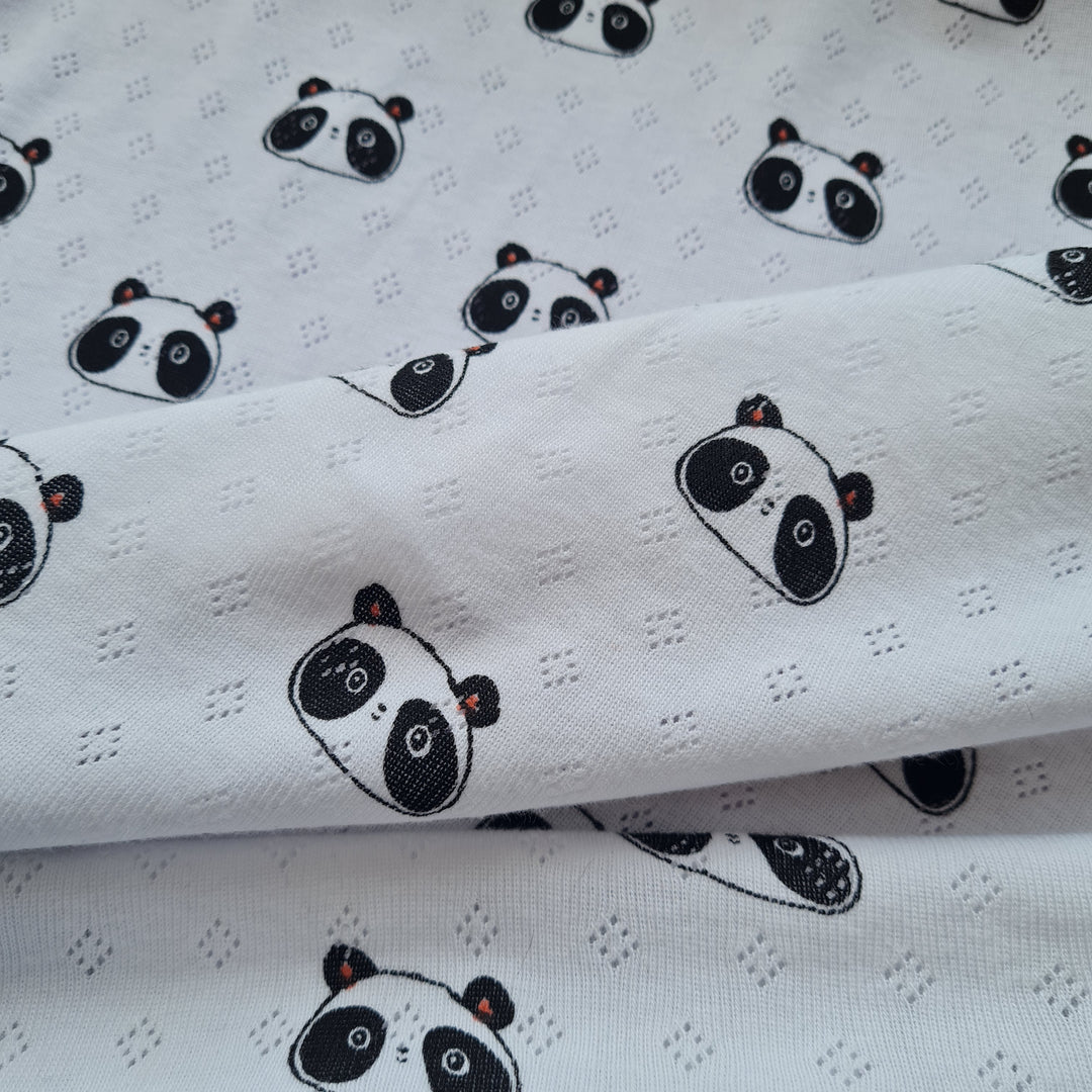 Panda Fine 100% cotton jersey knit with Diamond openwork/ Pointelle fabric. By Poppy. Cut to order by the 1/2 metre.