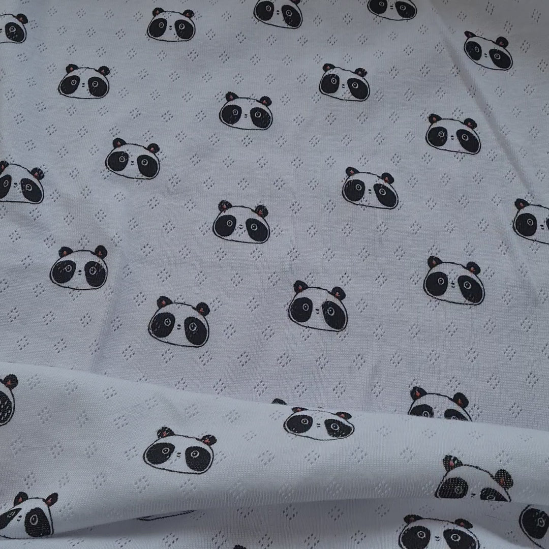 Panda Fine 100% cotton jersey knit with Diamond openwork/ Pointelle fabric. By Poppy. Cut to order by the 1/2 metre.