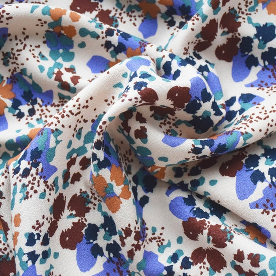 Primrose Iris 100% viscose floral crêpe woven dressmaking fabric. By Cousette.