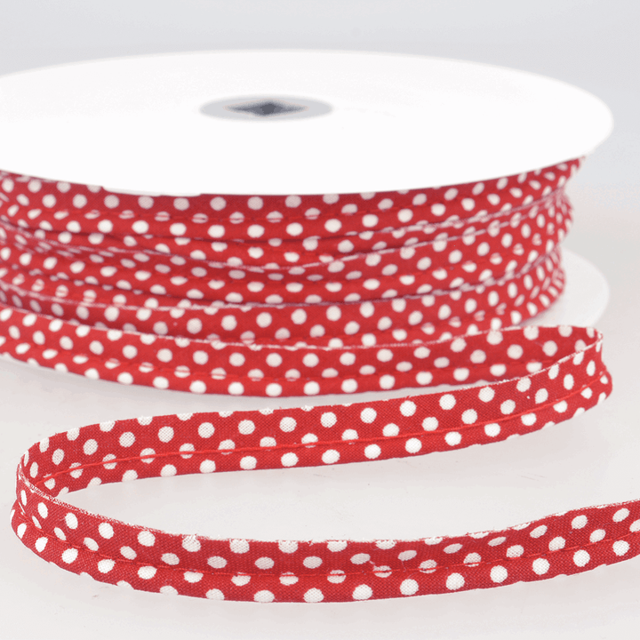 Patterned flanged 10mm wide piping cord trim 2 mm. Floral and polkadot trim. Per Metre