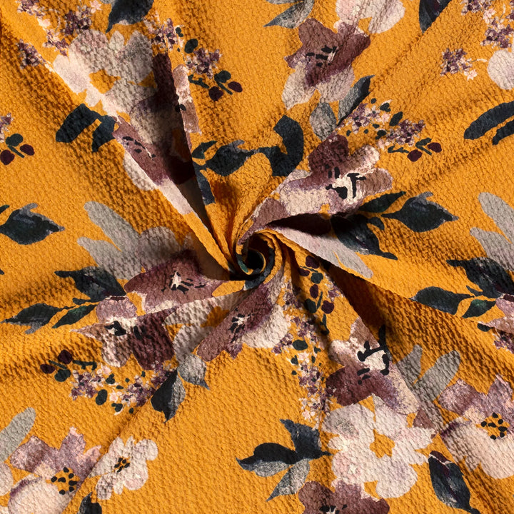 Stretch floral viscose seeksucker crepe fabric 1% Elastane. Ochre 1/2m