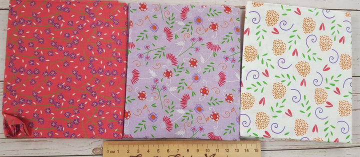 Cute florals bundle of 5 floral print cotton quilting fabrics. Craft Cotton Company. Pink, purple.