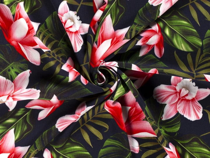 Tropical floral 100% Viscose crêpe dress fabric by the half metre. Navy blue.