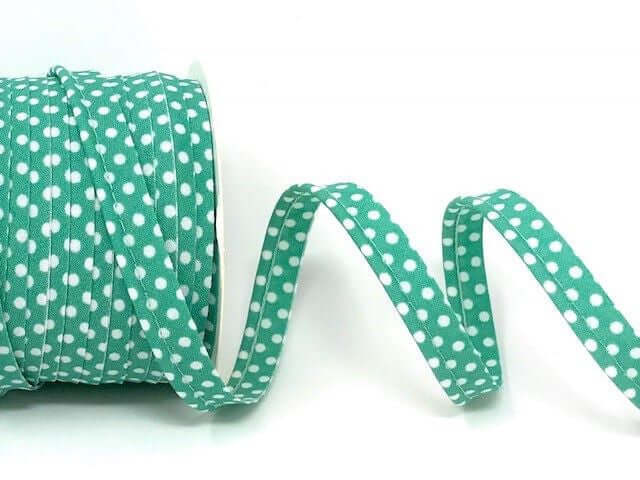 Patterned flanged 10mm wide piping cord trim 2 mm. Floral and polkadot trim. Per Metre